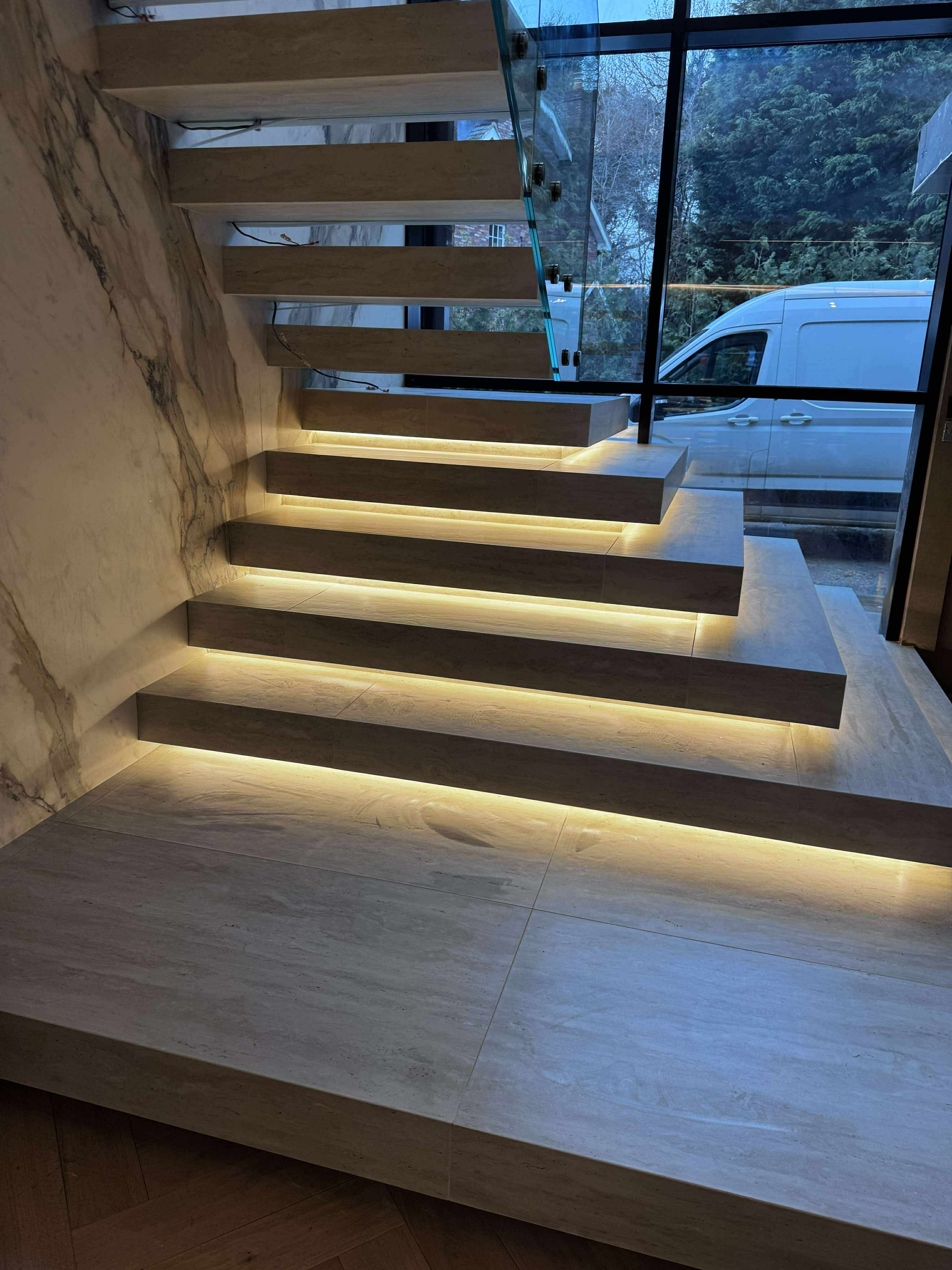 Porcelain staircase with concealed LED lighting