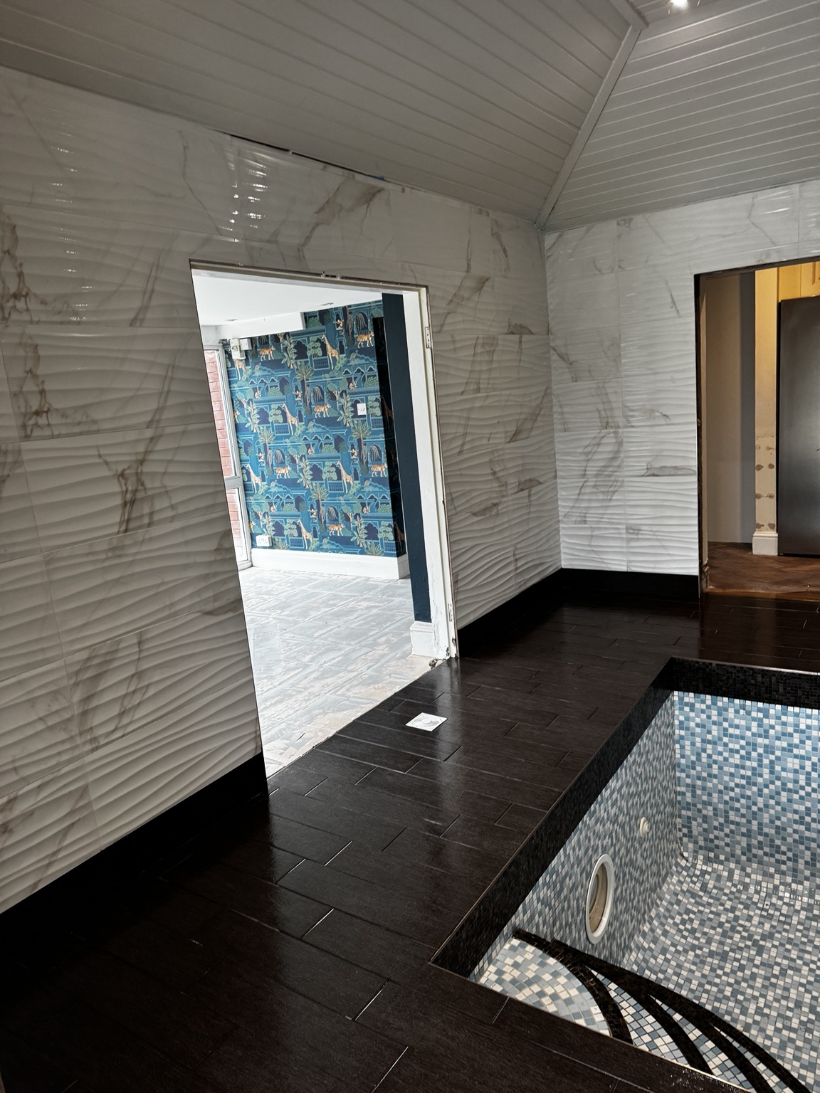 Swimming pool tiling and large format wall tiles